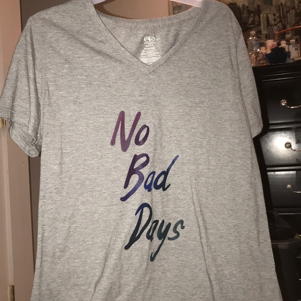 Grey athletic shirt.